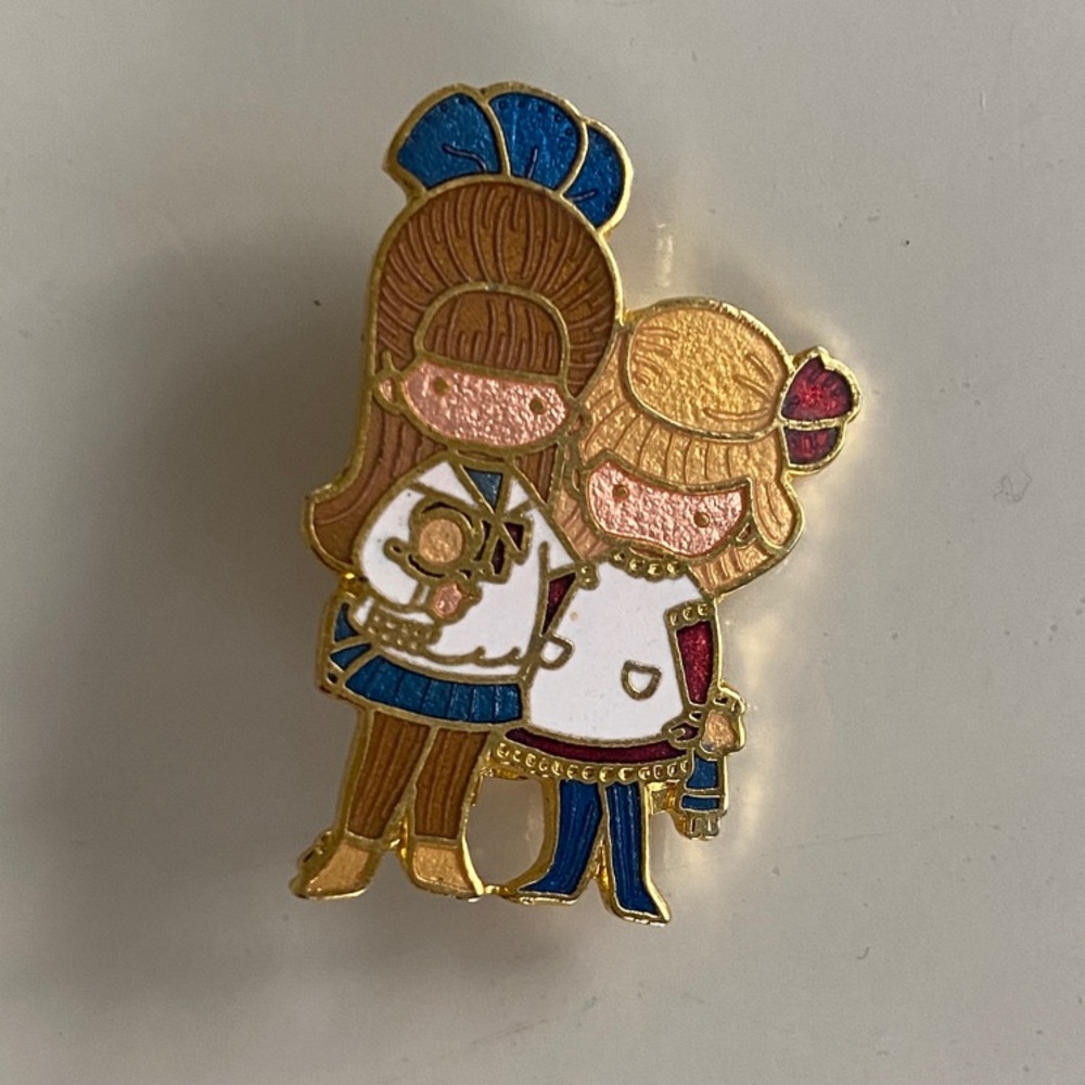 Joan Walsh Anglund Vintage Pin Sisters 2 Girls holding dolls 1972